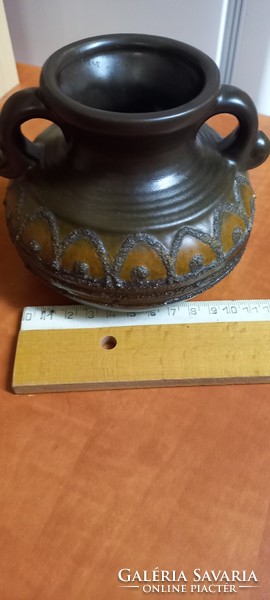 Small ceramic vase with two ears