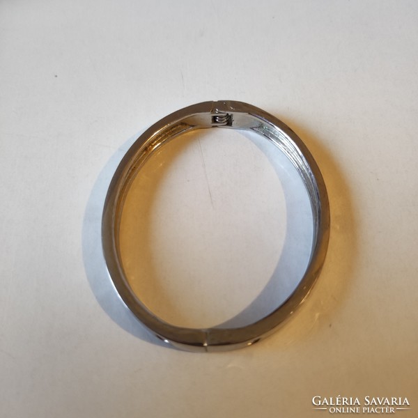 Cartier style silver metal bracelet