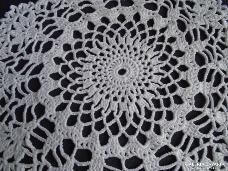 23 cm diam. Tablecloth crocheted from snow-white, soft cotton yarn.