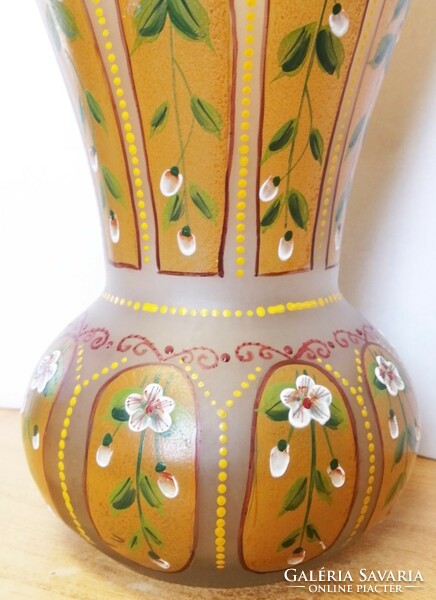 The Bohemia vase is a specialty. Banded with floral enamel painting