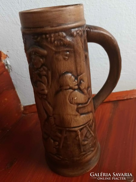 Large embossed glazed ceramic jug - with a fun scene