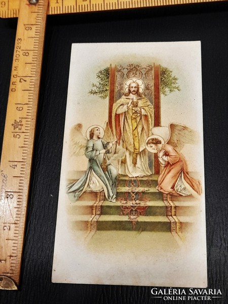 Holy image in an antique prayer book, prayer sheet