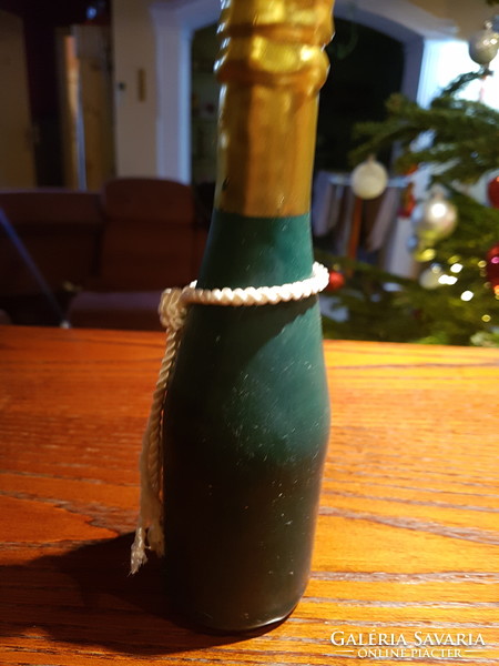 Candle in the shape of a wine bottle