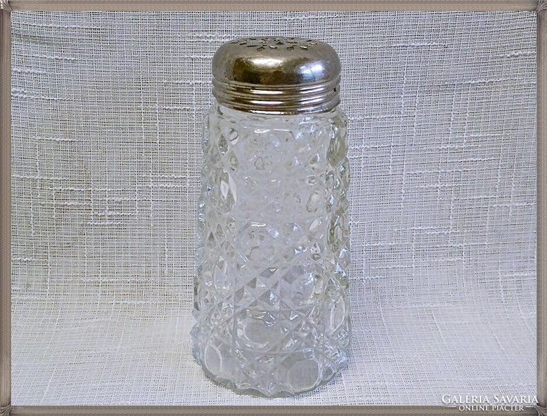 Antique pressed glass powdered sugar sprinkler with silver-plated metal head.