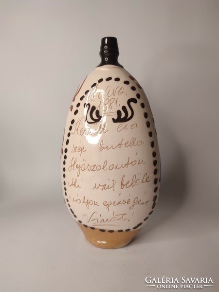 An inscribed earthenware bottle made from Hejóssalontan