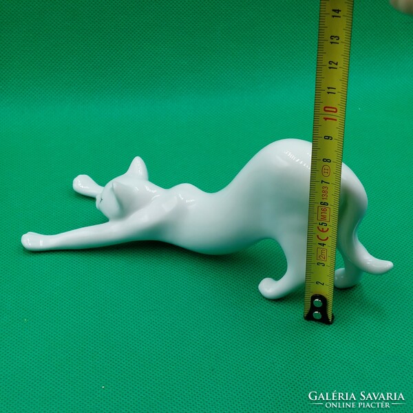 Stretching cat figurine from Raven House