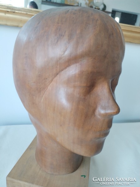 Female head - wooden sculpture / Ferenc on wheels