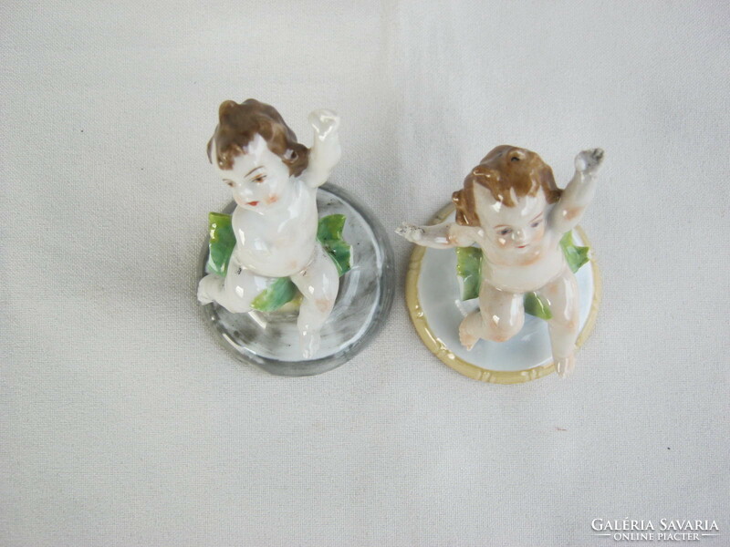 Pair of antique marked miniature porcelain puttos - damaged