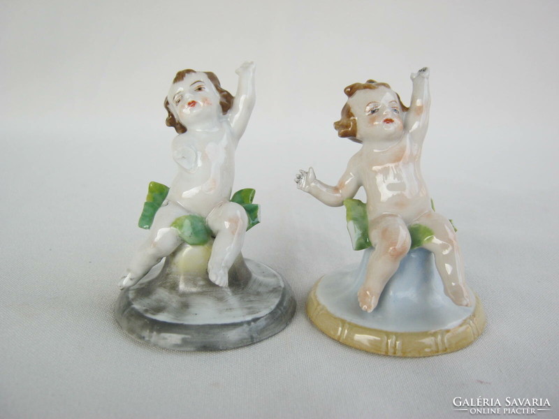 Pair of antique marked miniature porcelain puttos - damaged