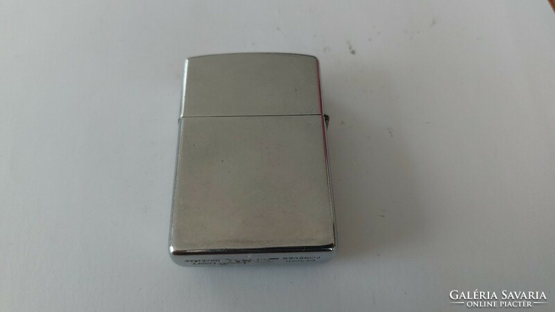 (K) cool petrol lighter, no petrol in it, gives a spark.