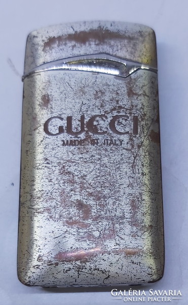 Old Gucci lighter.