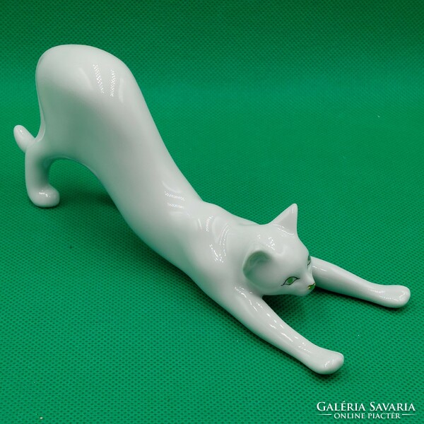 Stretching cat figurine from Raven House