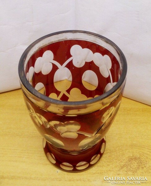 An incised ruby red chalice with a plum motif. Czech bohemia