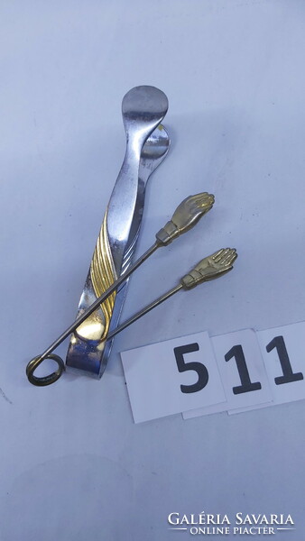 2 sugar tongs, sugar tongs, one in the shape of a special hand