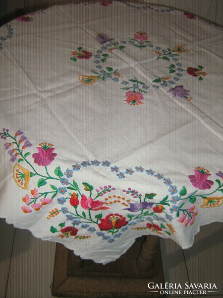 Beautiful hand-embroidered Kalocsa needlework tablecloth with a slinged edge