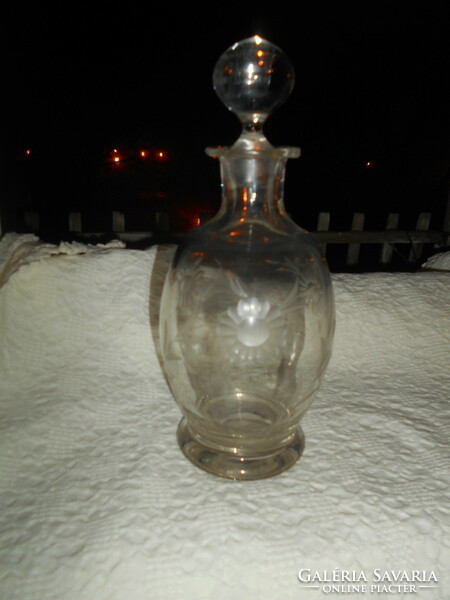 Antique polished heavy glass bottle with original stopper