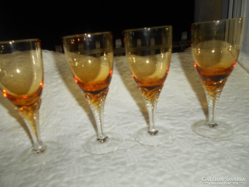 4 amber-colored glass goblets with feet - the price applies to 4 pcs