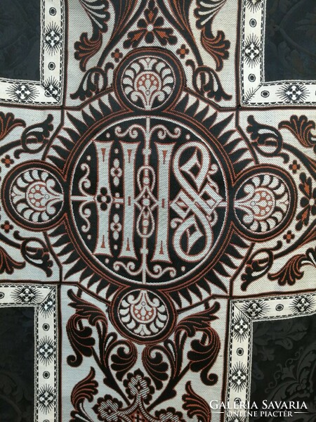 Black brocade vestment with silver trim