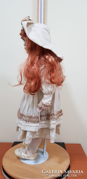 Beautiful red long-haired porcelain doll