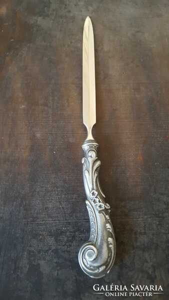 A beautiful leaf opener with a silver-plated handle