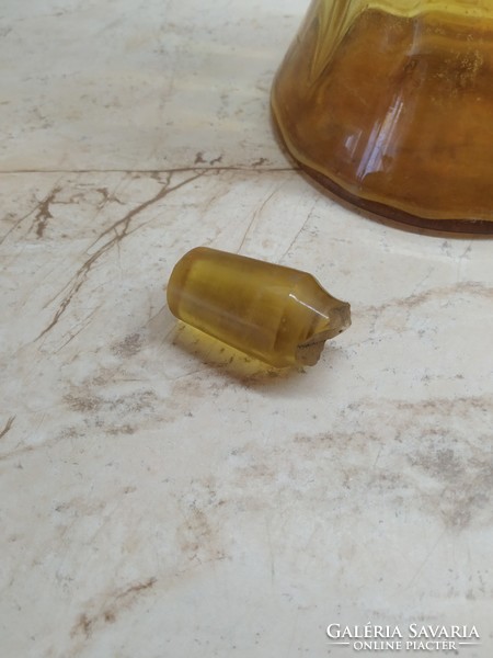 Amber colored broken glass and bottle for sale!