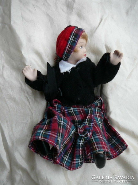 Doll with ceramic head, hands and feet