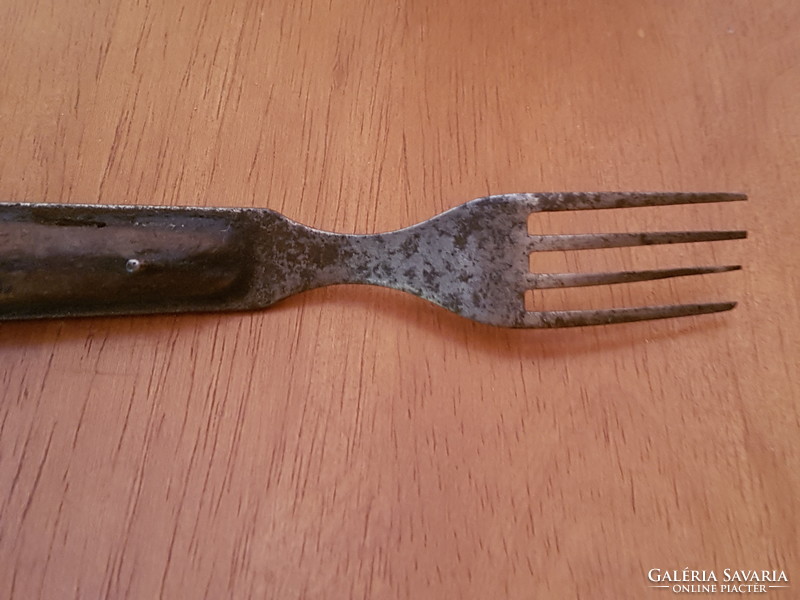 Very old fork with wooden handle