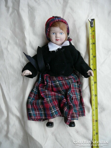 Doll with ceramic head, hands and feet