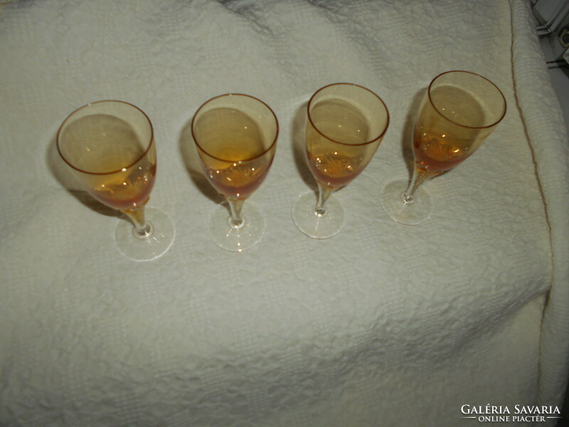 4 amber-colored glass goblets with feet - the price applies to 4 pcs