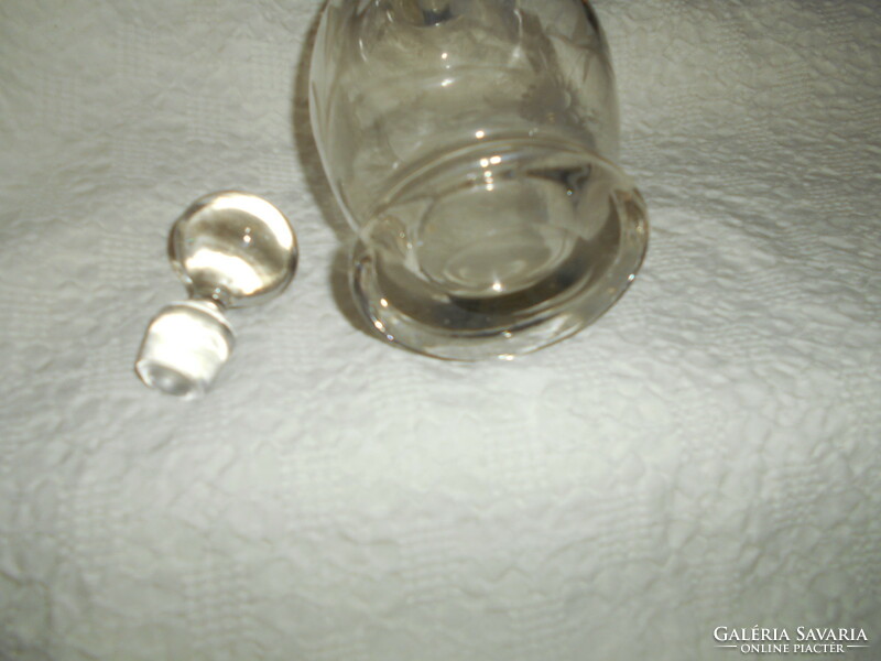 Antique polished heavy glass bottle with original stopper