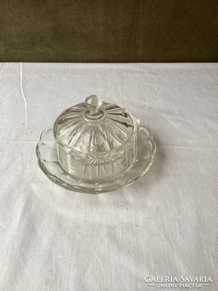 Old glass butter container.