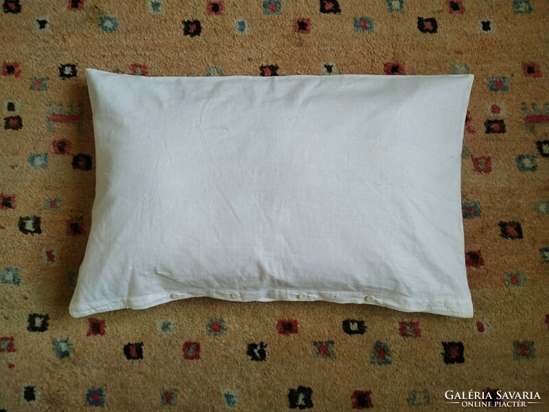 An old decorative cushion cover with a hinged scene