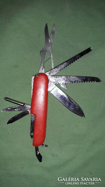 Retro swiss army knife with multiple functions with a vinyl handle when folded, 9 cm according to the pictures