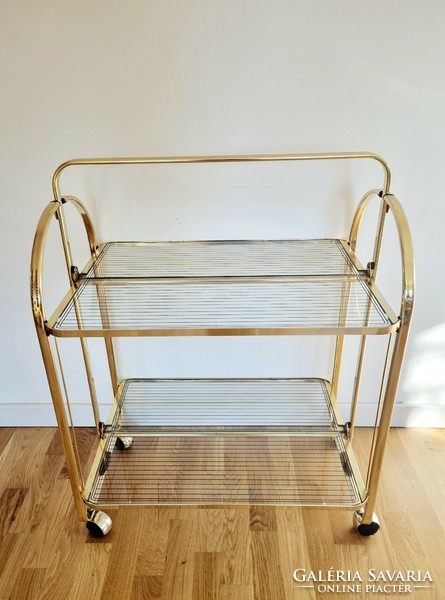 Vintage folding cart with glass shelves