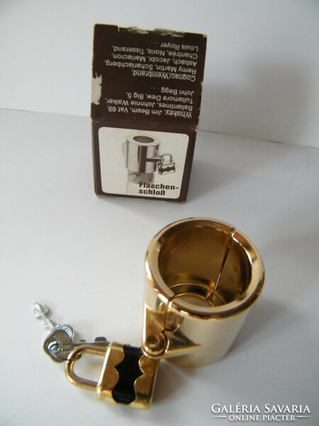 Gold-plated, padlocked glass stopper and cap