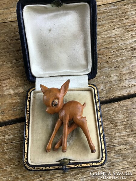 Old carved wooden deer brooch