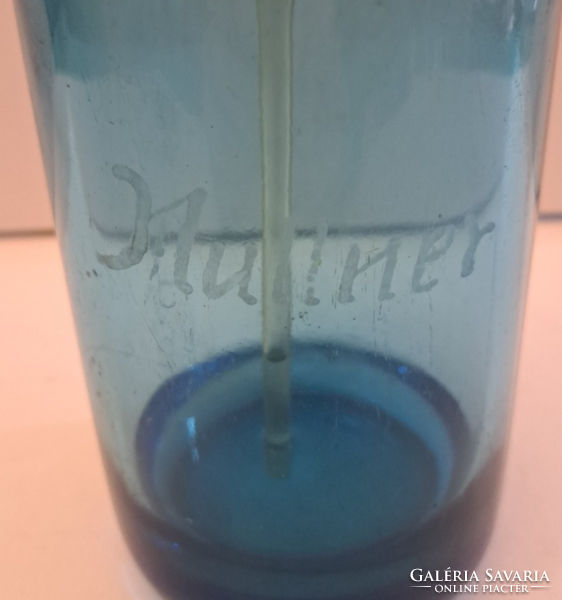 Moschendorf liter blue, labeled soda bottle with head