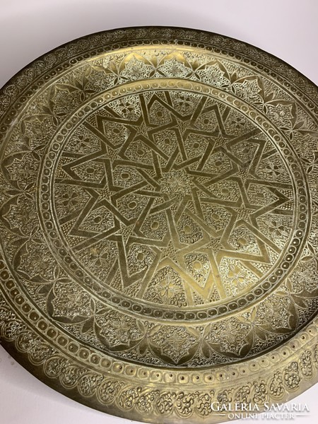 Moroccan copper bowl or plate is handmade