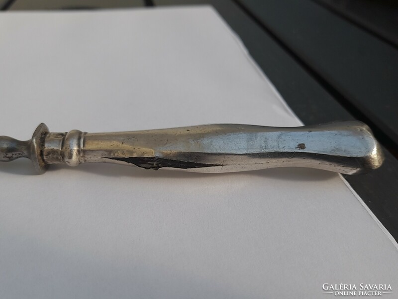 Silver-handled knife and fork in one