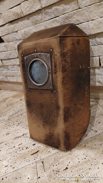 Old leather welding shield, tool
