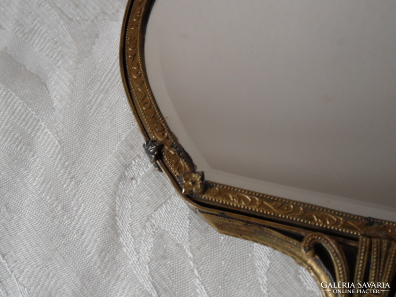 Antique old copper hand mirror