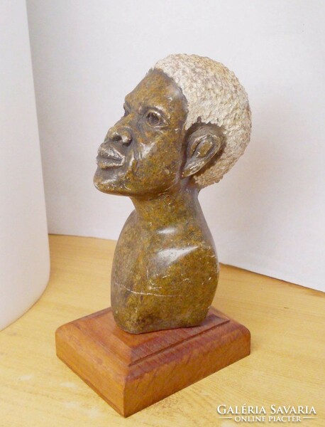 Native granite figure torso, small sculpture on a stained wooden plinth, handcrafted masterpieces
