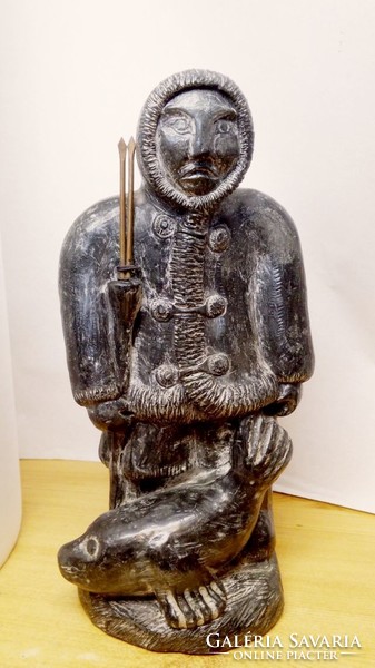 Inuit seal hunter armed with his prey wolf original signed soapstone small sculpture