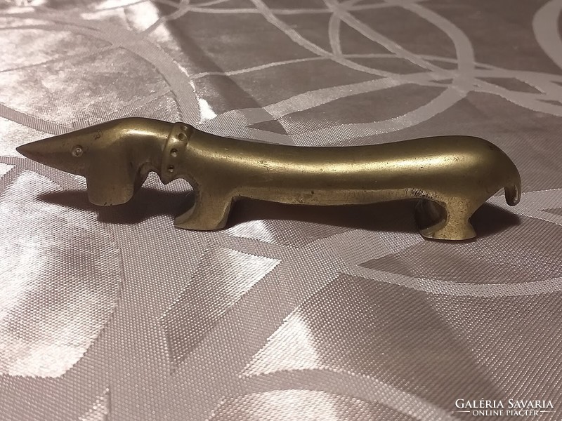 Copper dog, knife-holding goat