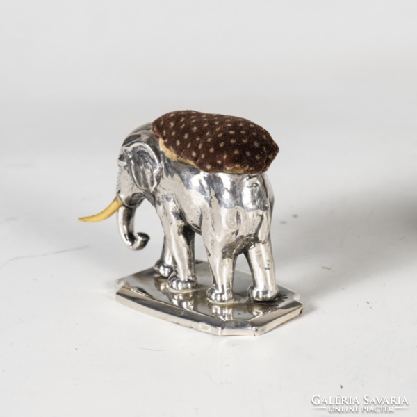 Silver elephant-shaped pin holder