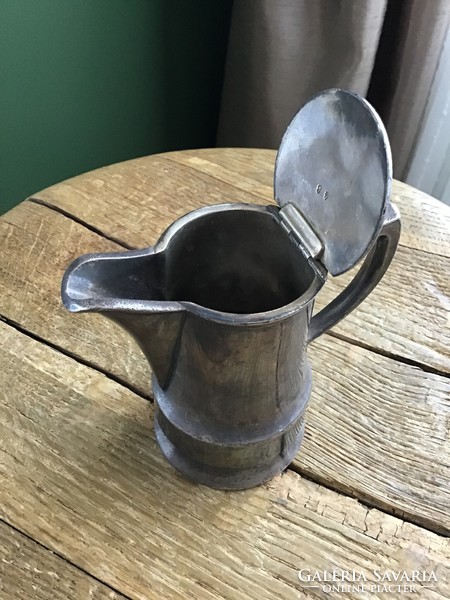 Antique silvered spout