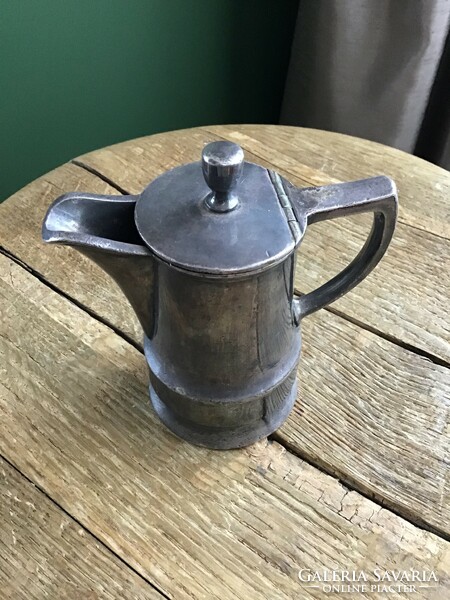 Antique silvered spout