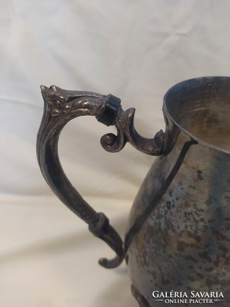 Antique metal spout