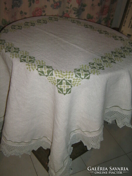 Wonderful hand embroidered green cross-stitch crocheted woven needlework tablecloth