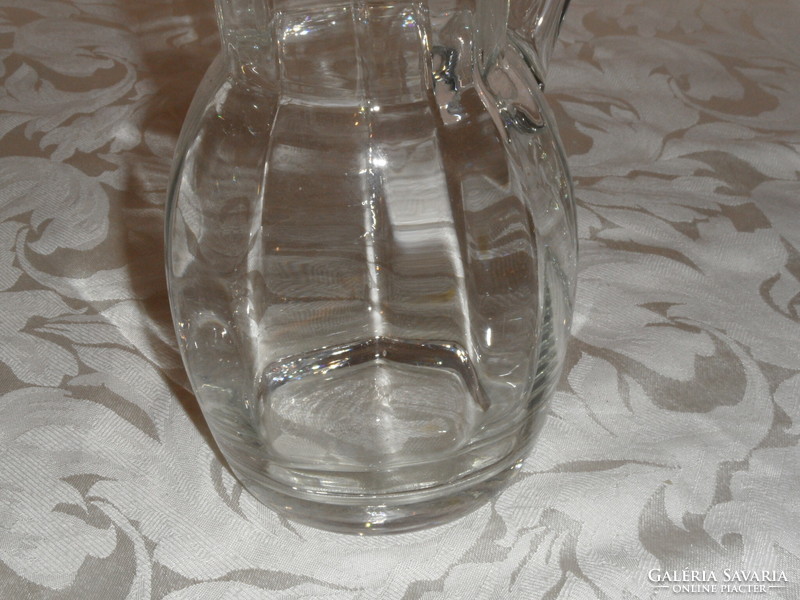 Older glass water and wine jug